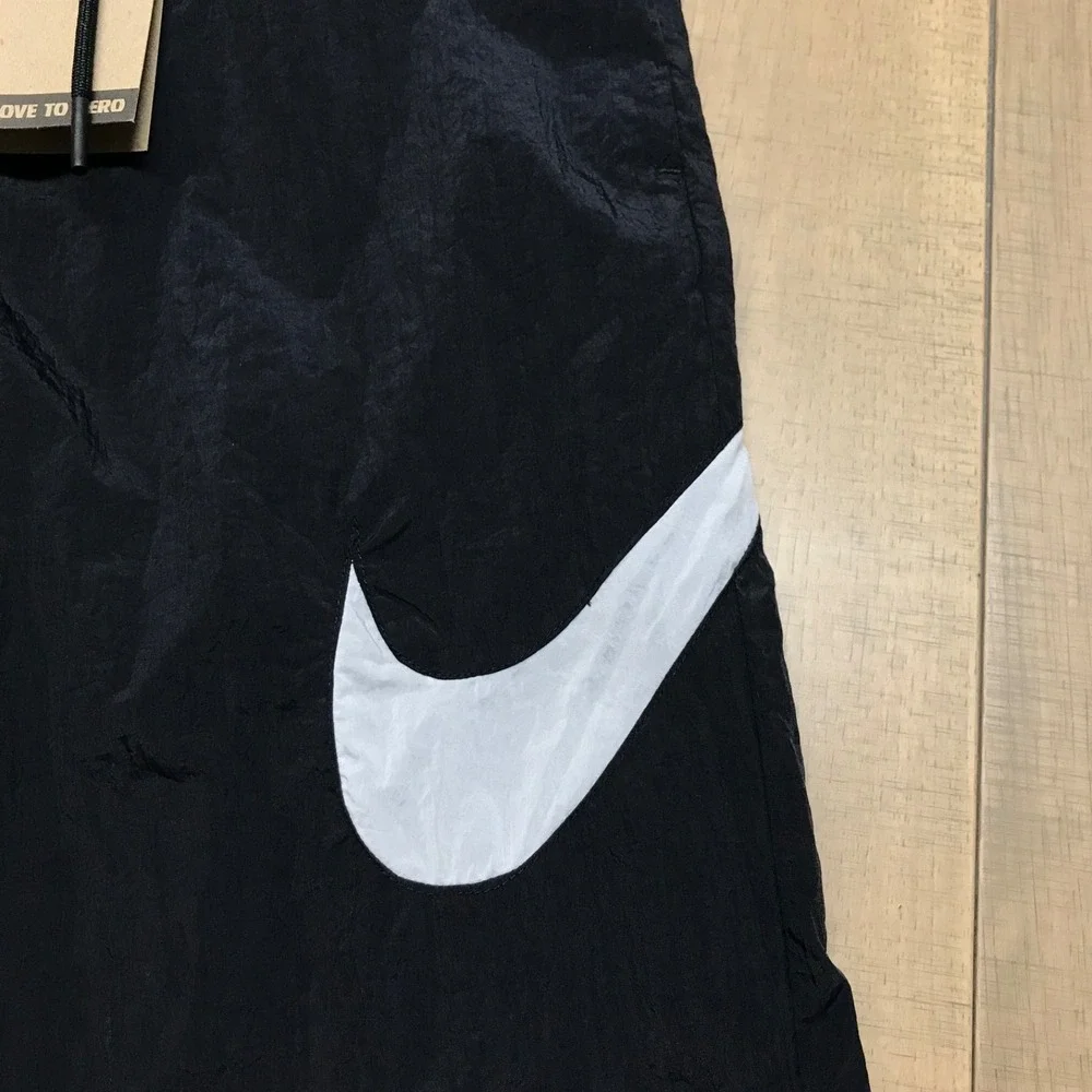 Nike Pants Womens Size S Black Loose Fit Nylon Mesh Lined Sportswear‎